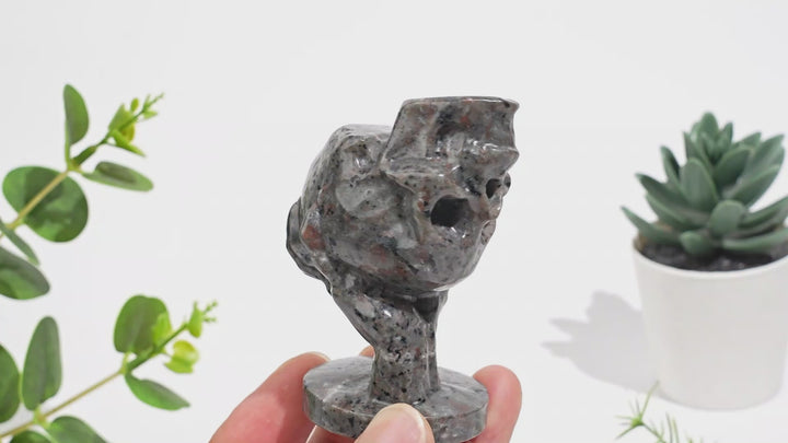 Natural Crystal Hand Holding Upside-Down Skull Carving