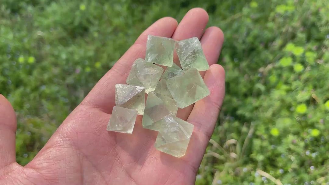 A Slightly Imperfect Natural Green Fluorite Octahedron Crystal