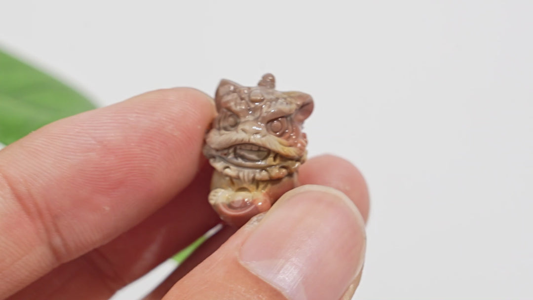Natural Crystal Alashan Agate Lion Dance Mini Carving
