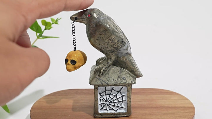 A Slightly Imperfect Natural Crystal Pyrite Raven With Hanging Skull