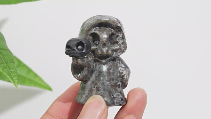 Natural Yooperlite Ghost Holding Skull Carving