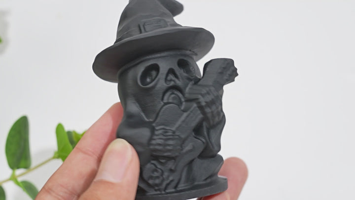A Slightly Imperfect Natural Crystal Black Obsidian Guitar Playing Skull
