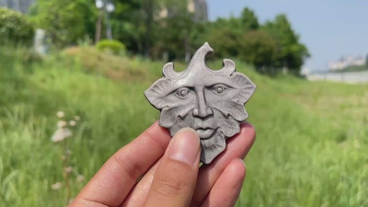 Natural Crystal Silver Obsidian Leaf Face Carving