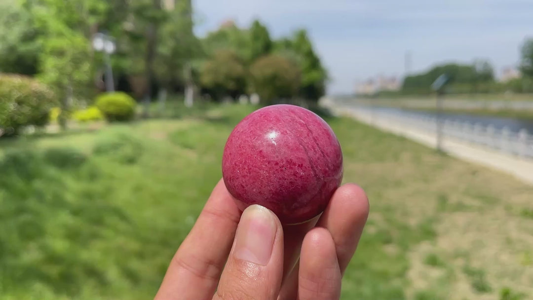 Natural Rhodonite In Quartz Sphere